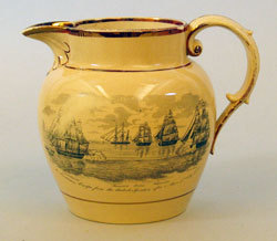Staffordshire creamware pitcher featuring scenes from Constitution's 1812 victories. USS Constitution Museum Collection.
