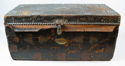Brass bound leather chest belonging to Gunner John Lord, USN. USS Constitution Museum Collection.