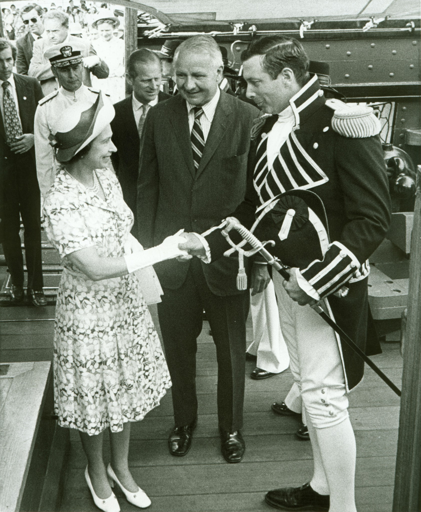 Commanding Officer Tyrone G. Martin welcomed Queen Elizabeth II aboard USS Constitution, along with Secretary of the Navy J. William Middendorf (center) and Prince Philip (background), on July 11, 1976. [Courtesy U.S. Navy]