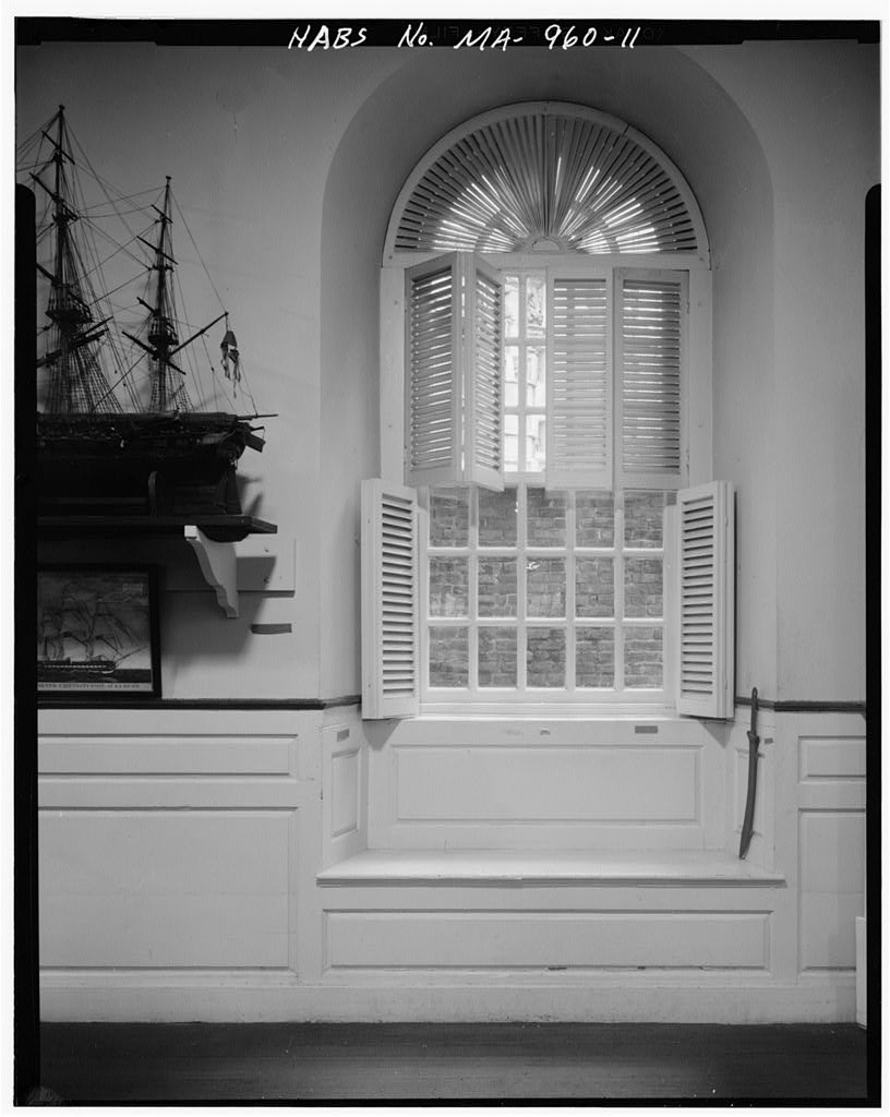 A 1968 photograph titled “TYPICAL WINDOW – Old South Meetinghouse [sic], Washington & Milk Streets, Boston, Suffolk Country, MA” by Cortland V. Hubbard for the Historic American Buildings Survey. Luckily, when photographing this window at the Meeting House, Hubbard also captured a tantalizing glimpse of the nearly 100-year-old model of Constitution. At this point, the model had been displayed continuously at the Meeting House for over 65 years. Note the degradation to the ship’s spars, rigging, and flag.[Courtesy Library of Congress]