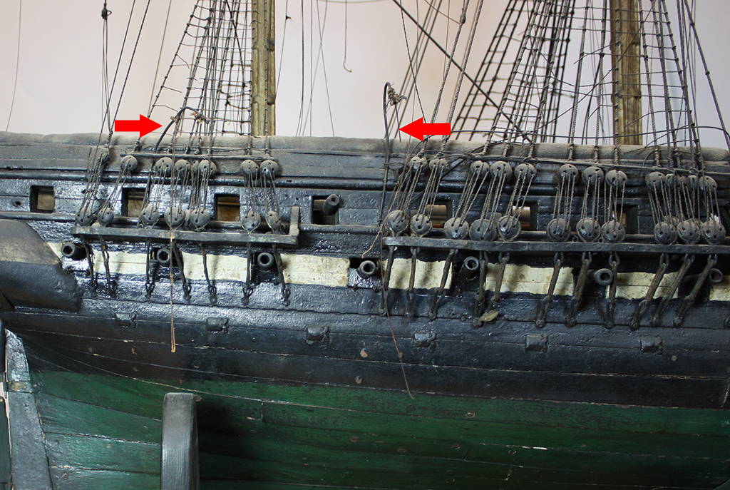 The Loring model in 2013 before the restoration commenced. The red arrow points to the forward davit of the aftermost pair of davits. [Courtesy USS Constitution Museum]