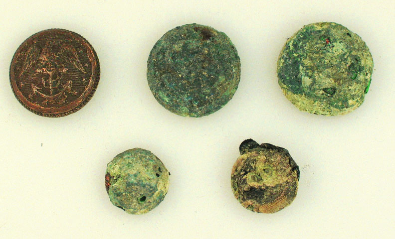 Copper and gold buttons from Captain John Gwinn's uniform. [USS Constitution Museum Collection, 2152.1-22]