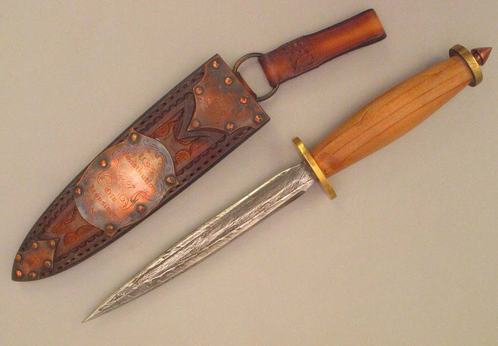 A knife and sheath made from materials removed for USS Constitution, 2006. [USS Constitution Museum Collection.]