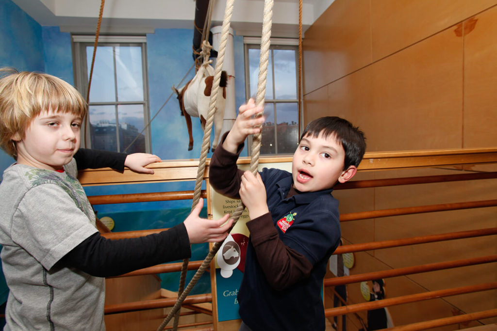 Kids pulling on rope
